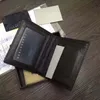 ¡Nuevo diseñador! Cartera de hombre de doble pliegue de alta calidad Tejido a mano Monedero de cuero de piel de cordero Monedero corto Traje Clip Caja de regalo Bolsa de color negro