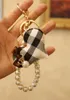 New handmade plaid bear keychain pendant fabric love pearl bag hanging jewelry wrist rope