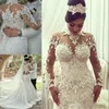 Azzaria Haute Couture Nigeria Suknie ślubne Syrenka Długie rękaw Wysoka szyja 3D Kwiacyjna Koronka Plus Arabskie suknie ślubne Fishtail 249Q