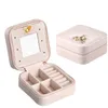 Nouvelle belle mini boîte PU en cuir Pu Portable Travel Jewelry Organisateur Affichage Boîtier de rangement pour les anneaux Collier