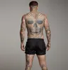 Mens sexiga baddräkt badkläder män simma shorts män briefs strand shorts sport kostymer surfbräda shorts män simma trunkar