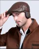 Chapeau en cuir pour hommes en plein air hiver Bérets mâle chaud casquette de protection des oreilles 100% cuir véritable papa chapeau en gros Loisirs os S18101708