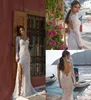 Lian Rokman 2018 Mermaid Wedding Dresses Side Split Lace Applique One Shoulder Long Sleeve Bridal Gowns Sweep Train Backless Wedding Dress