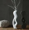 Ceramica minimalista Arte creativa vaso di fiori secchi decorazioni per la casa artigianato camera decorazioni di nozze vasi fatti a mano figurine di porcellana