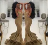 2018 Gold Arabiska paljetter sjöjungfru aftonklänningar Split Spaghettis Straps Mermaid Gold Evening Gowns Lace Appliques Open Back Prom Gowns