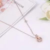 Collana da donna con ciondolo a doppio anello in oro rosa tutto abbinato Collana con ciondolo a forma di ciondolo con motivo a quattro foglie fortunato