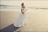 Um vestido de linha vintage de cristal cetim colher pescoço frisado trem varredura feito sob encomenda ruched praia vestido de casamento