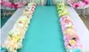 Flower Wedding Road blommor Långa bord mittpieces blommor båge dörr lintel siden rose bröllop parti bakgrunder dekoration1053985