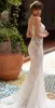 ナーマアナトのウェディングドレスレースシアーネックアップリケマーメイドスタイルのウェディングドレス魅力的な背中の開いたブライダルドレス