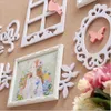 Cornice da parete con cornice per uccelli, design primaverile, bella bicicletta, set da 5 pezzi, cornice in legno bianca e rosa, marco foto9991605