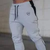 2019 Casual Gym Herren Hosen Neue Bodyboulding Kleidung Straße Hosen Fitness Jogger Jogginghose Männliche Schweiß Hosen Mit M-XXL211A