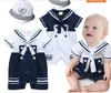 entier 2019 Nouveau petit garçon saut-gâchier Sailor Navy Style Costume Costume Coton Coton Colaire courte avec chapeau bébé combinaison 4pcslot 03age AB2702526