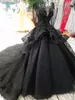 Vintage Black Ball Gown Wedding Dresses Cap Sleeve V Neck Beaded Lace Open Back Ruffle Court Train Bridal Wedding Gowns Real Pictures