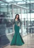 Sexy 2018 V Neck Dark Green Saudi Lace Dubai Evening Dresses Wear Appliques Long Sleeves Sweep Train Arabic Formal Party Mermaid Prom Dress