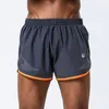 Sportsmän som kör shorts andningsbar snabb torr svart grå fitness gym kort homme stor storlek6917129