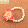 Clay Frangipani Plumeria Flower Pearl Beaded Strands Stretch Armband 6.5 "BB80 Mode Smycken Armband