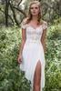 Sexy Goedkope Zomer Beach Bohemian Sexy Trouwjurk Sheer Hals Cap Sleeves Robe de Mariage Sweep Trein Trouwjurk Bruidsjurken Kerk