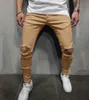 Pantalones con agujeros de color sólido para hombre Pantalones pitillo de diseño ajustados y ajustados Pantalones de calle para adolescentes masculinos 57 185