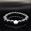 Pulsera de piedra negra para hombre, pulsera de terapia magnética, bonita pérdida de peso, cuidado de la salud redondo, hematita magnética, pulsera de cuentas elásticas para hombre