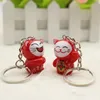 2018 Nyckelkedja Lovely Cartoon Maneki Neko Lucky Cat Mini Plastic Toy Keychain för Barngåva Purse Charms Pendant Key Ring