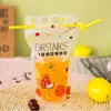 100個のかわいいフルーツ漫画のカラフルなプラスチックの飲み物の飲料ジュースミルクコーヒーのための包まれた袋のポーチ、穴のハンドル450ml