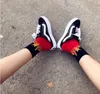 chaussettes hiphop de mode tricoter des chaussettes de flamme de coton style Harajuku chaussettes de sport de skateboard coréen chaussettes d'amoureux chaussettes de basket-ball de cyclisme en plein air