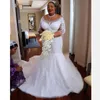 Glamorös afrikansk sjöjungfru bröllopsklänning pärlor applique av axel 3/4 långärmad brudklänning sexig plus storlek Dubai tulle bröllopsklänning