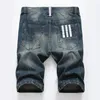 2017 mannen mode broek jongens jeans heren knop witte print randen slanke jeans gratis schip 9003777