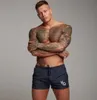 Mens sexiga baddräkt badkläder män simma shorts män briefs strand shorts sport kostymer surfbräda shorts män simma trunkar