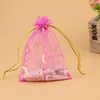 Hot Sale 100pcs / Lot Organza Färgglada väskor Moon och Star Drawstring Pouches Popular Gift Bagspouches Billiga 7 * 9cm Smycken Väska