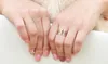 Marca desgin jóias de luxo nova chegada mais vendido aço inoxidável rosa ouro festa oco camélia feminino anel de banda de casamento para lo3533862