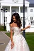 Blumendruck 2019 Ballkleid Brautkleider Schulterfrei Backless Tüll Kapelle Hochzeit Tragen Tiered Rock Illusion Top Brautkleid