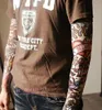 12 pièces mélange élastique faux manchon de tatouage temporaire 3d Art conçoit corps bras jambe bas Tatoo Cool hommes femmes 2017 New8768191
