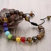 2021 Beaded Strands Seven Chakra Energy Stone Handsträng av naturlig grön och guldögon Justerbar vävd Bangle Lava-Rock Yoga armband