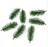 Billiga 50pcs Artificial Plants Pine Branches Julgran Bröllopsdekoration DIY Handcraft Tillbehör Barn Presentbukett