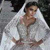 Luxurious Arabic Ball Gown Wedding Dresses 2019 Glamorous Long Sleeves Tulle Appliques Beaded Sequins church train Fitted Bridal Gowns