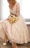 Vintage koronkowe krótkie suknie ślubne vestido de novia 2019 Nowy łuk V-dec-dec-line 3 4 Długość herbaty z długim rękawem Suknie ślubne W1842445