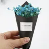 Small fresh starry handmade dried flowers gifts shooting props Christmas holiday gift bouquet with hands ceremony