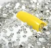 1440 stks / partij Nail Art Glitter Steentjes Wit Crystal Clear Fastback DIY Tips Sticker Kralen Nail Jewelry Accessoire Gratis Verzending