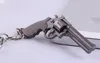 6 cm Miniatyr Revolver Pistol Vapen Mode Modell Nyckelring Nyckelringar Ny Mini Gun nyckelring för män Smycken Överraskningspresent