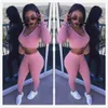 EUR Fashion Sexy Crop Top med Leggings Byxor 2 st \ Set Solid Stickade High Hip Clothing Tracksuits