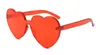 Lunettes de soleil en forme de coeur One Pieces sans monture femmes lunettes de soleil couleurs de bonbons lentilles 11 couleurs lunettes en gros