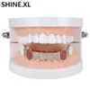 Placcato oro 18K denti del vampiro Grillz ghiacciato fuori il micro pavimenta cubico zircone 8 Tooth Hip Hop Grill Body Jewelry inferiore