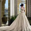 Underbara Långärmade Bröllopsklänningar Sheer Backless Sexig Tulle och Lace Bröllopsklänning Count Tåg Anpassade Bröllopklänningar 3D Appliques
