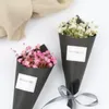 Small fresh starry handmade dried flowers gifts shooting props Christmas holiday gift bouquet with hands ceremony