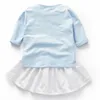 Kinderkleding lente en herfst meisje blauwe ronde kraag Lange mouwen T-shirt en witte korte rok pak twee stukken