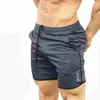 Мужские Летние тонкие шорты тренажерный зал Фитнес бодибилдинг работает бег бегущий мужской короткопродукты длиной колена дышащая сетка Sportswear1