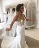 Illusion corsage nouveau 2019 robes de sirène col transparent dentelle appliqué balayage Train Satin Sexy dos nu robe de mariée