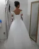 Abiti Abiti da sposa Bateau Maniche lunghe Illusion Abiti da sposa a strati ALine Indietro LaceUp FloorLength Abiti da sposa peplo su misura