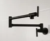 black wall mount kitchen faucet